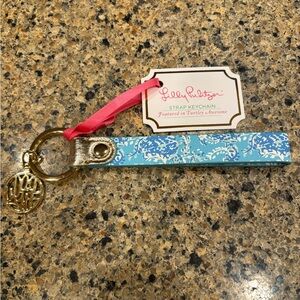 Lilly Pulitzer Blue and White Keychain with Gold Charm